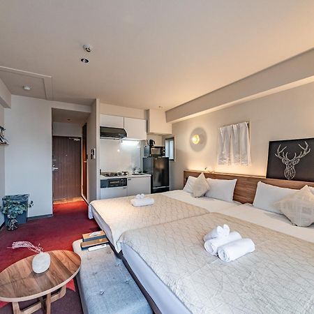 Apartment Hotel 11 Shinsaibashi Amemura Osaka Bagian luar foto