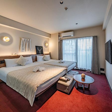 Apartment Hotel 11 Shinsaibashi Amemura Osaka Bagian luar foto