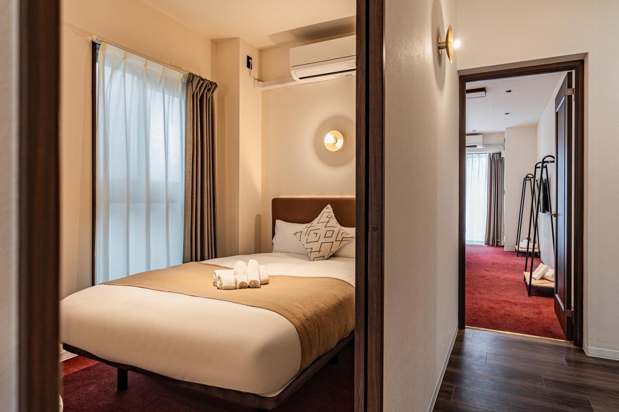 Apartment Hotel 11 Shinsaibashi Amemura Osaka Bagian luar foto