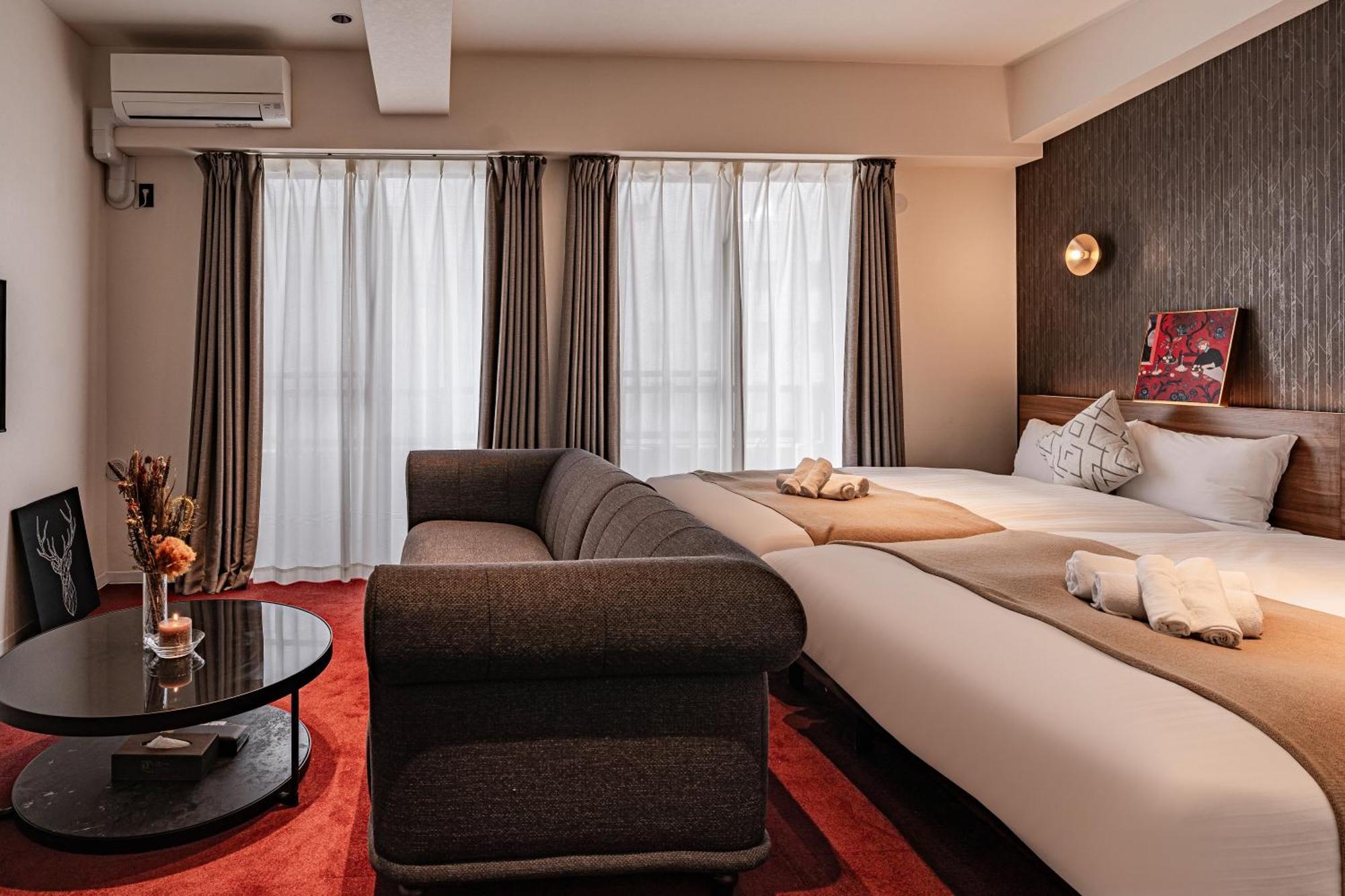 Apartment Hotel 11 Shinsaibashi Amemura Osaka Bagian luar foto