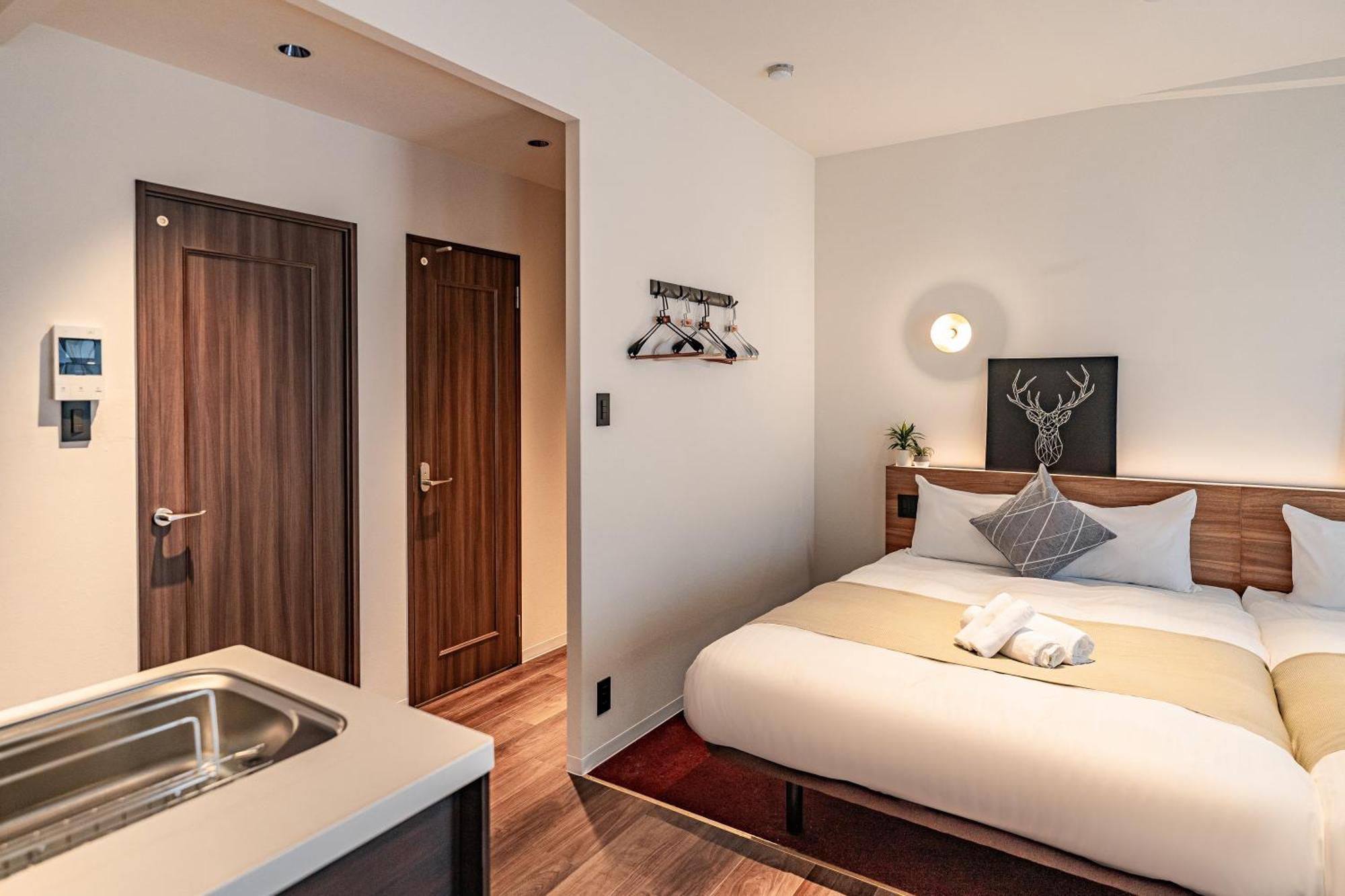 Apartment Hotel 11 Shinsaibashi Amemura Osaka Bagian luar foto
