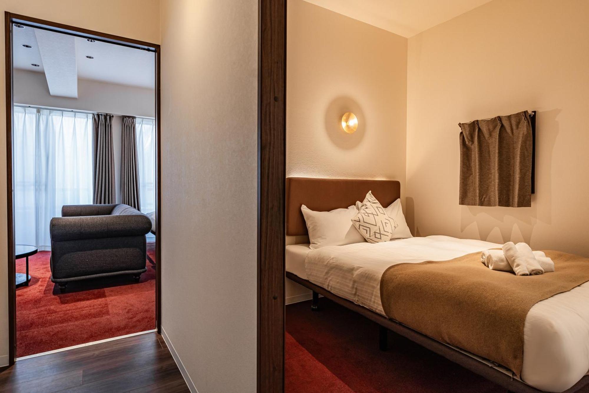 Apartment Hotel 11 Shinsaibashi Amemura Osaka Bagian luar foto