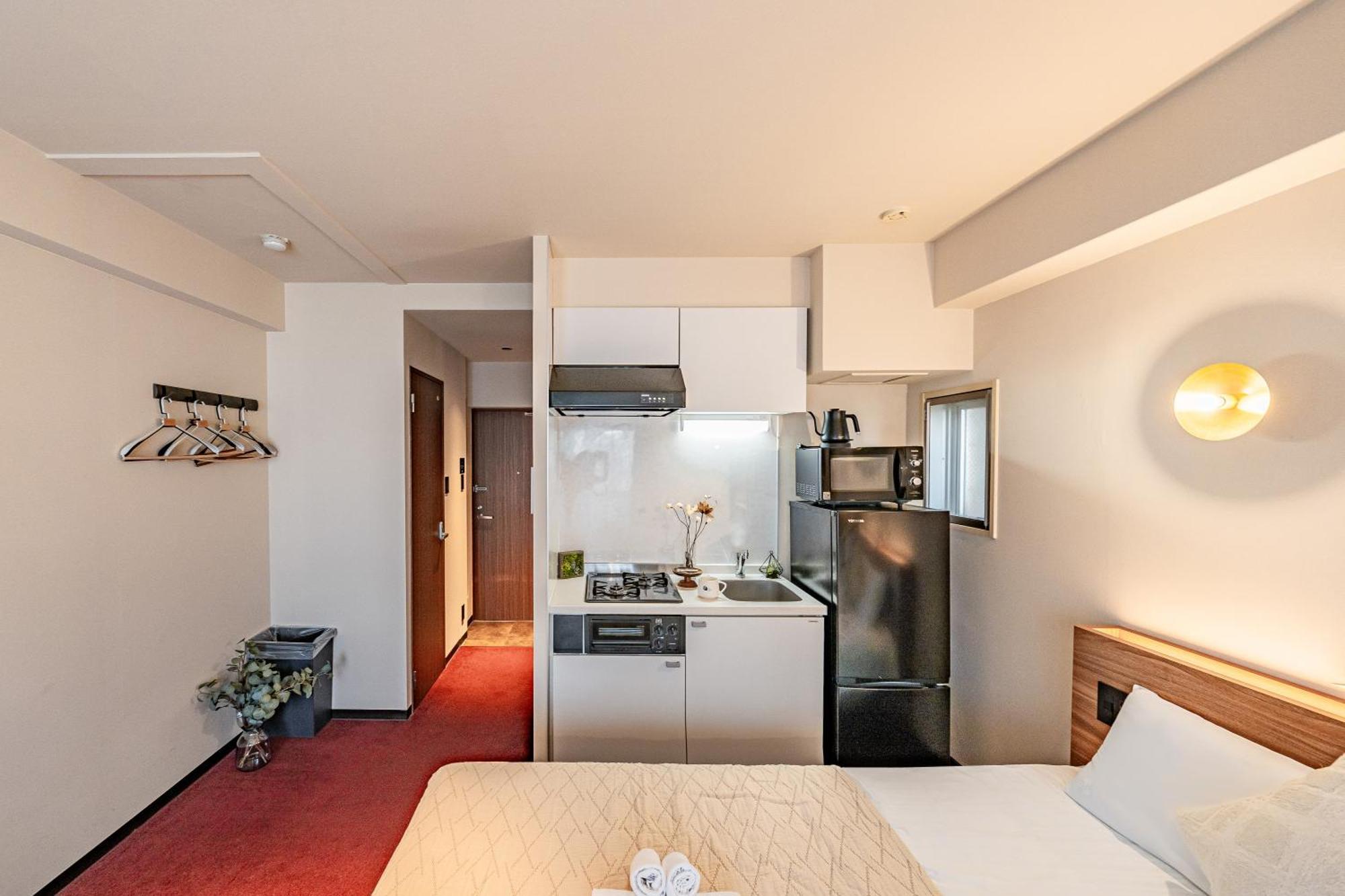 Apartment Hotel 11 Shinsaibashi Amemura Osaka Bagian luar foto